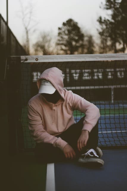 Person wearing a comfortable organic cotton hoodie