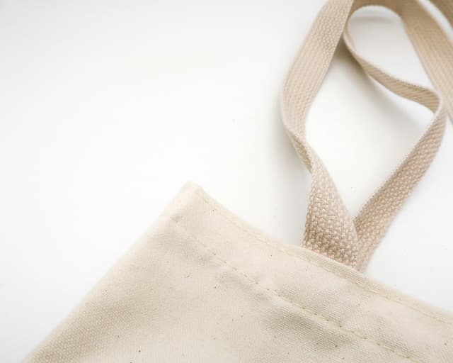 Organic cotton tote bag with Cozy Threads logo