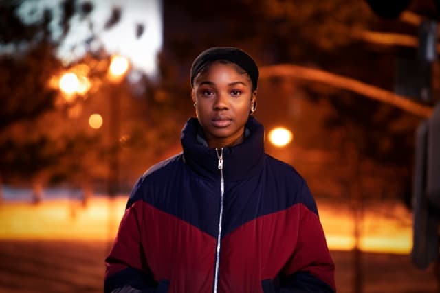 Person wearing a cozy recycled fleece jacket